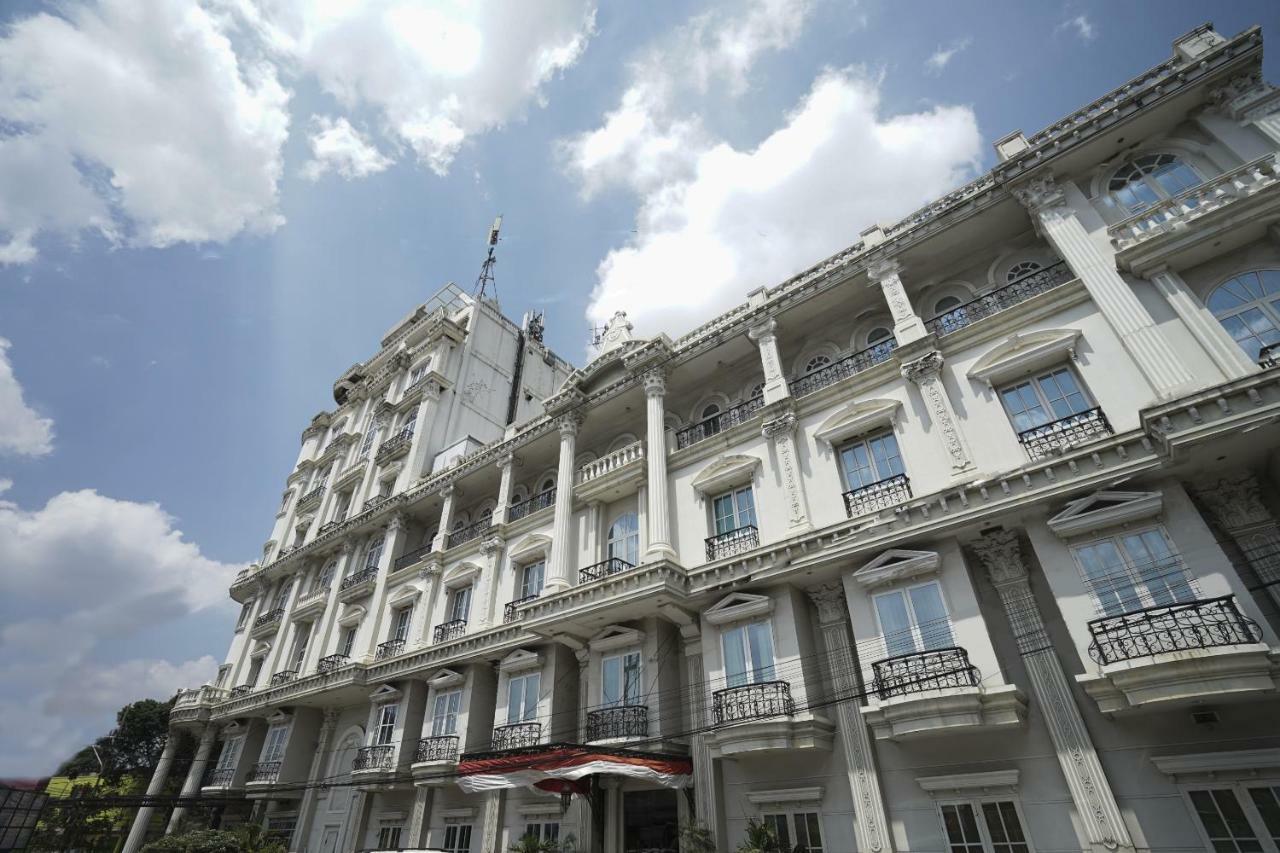 Capital O 1128 Hotel Imara Palembang Exterior photo