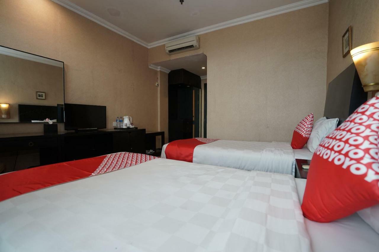 Capital O 1128 Hotel Imara Palembang Exterior photo