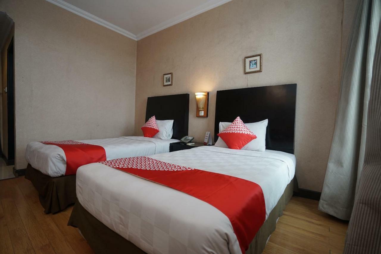 Capital O 1128 Hotel Imara Palembang Exterior photo