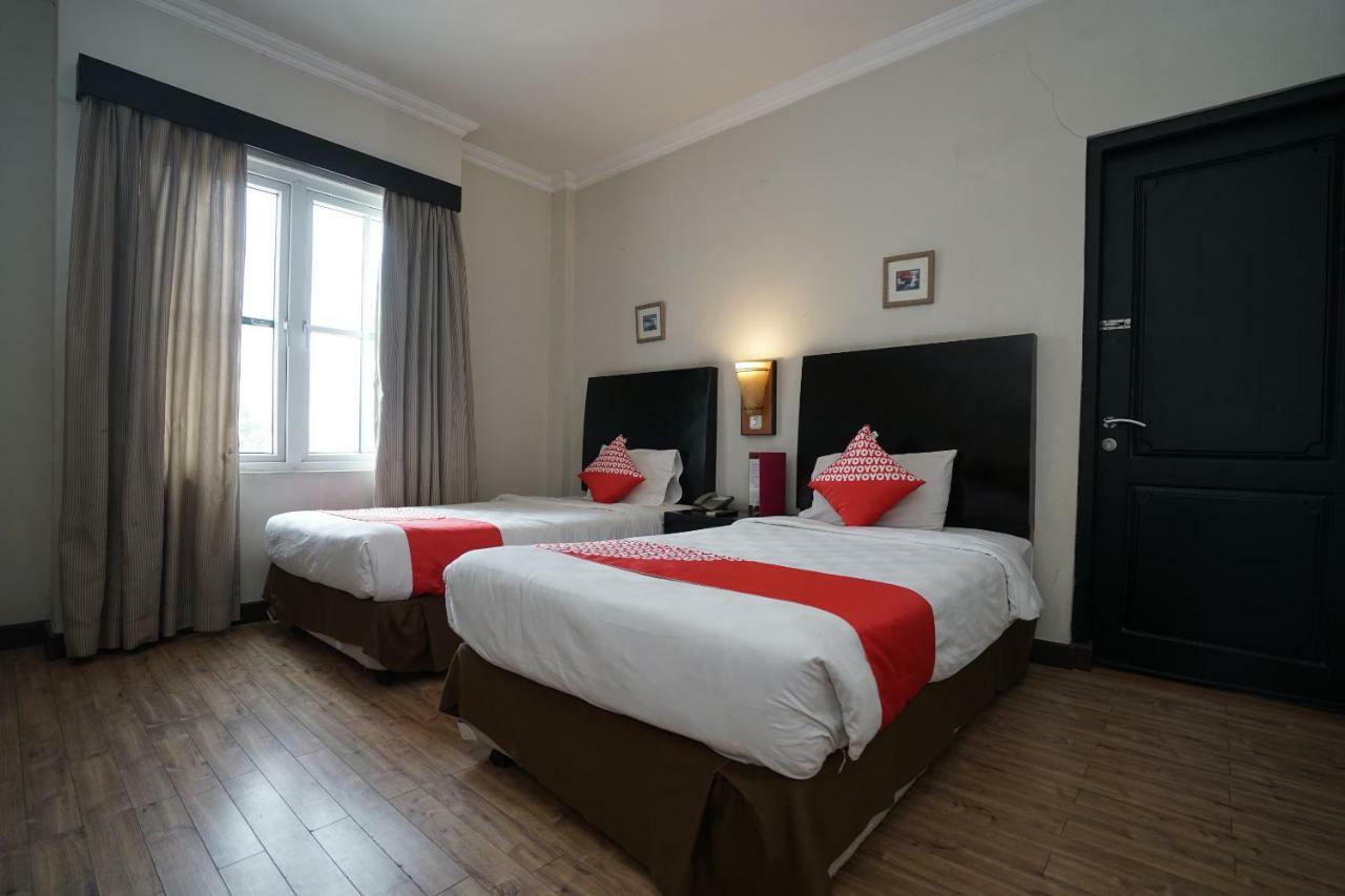 Capital O 1128 Hotel Imara Palembang Exterior photo