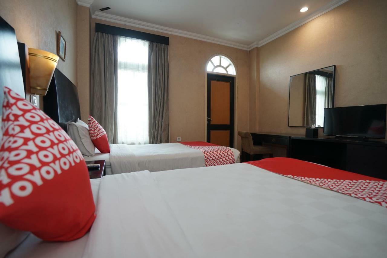 Capital O 1128 Hotel Imara Palembang Exterior photo