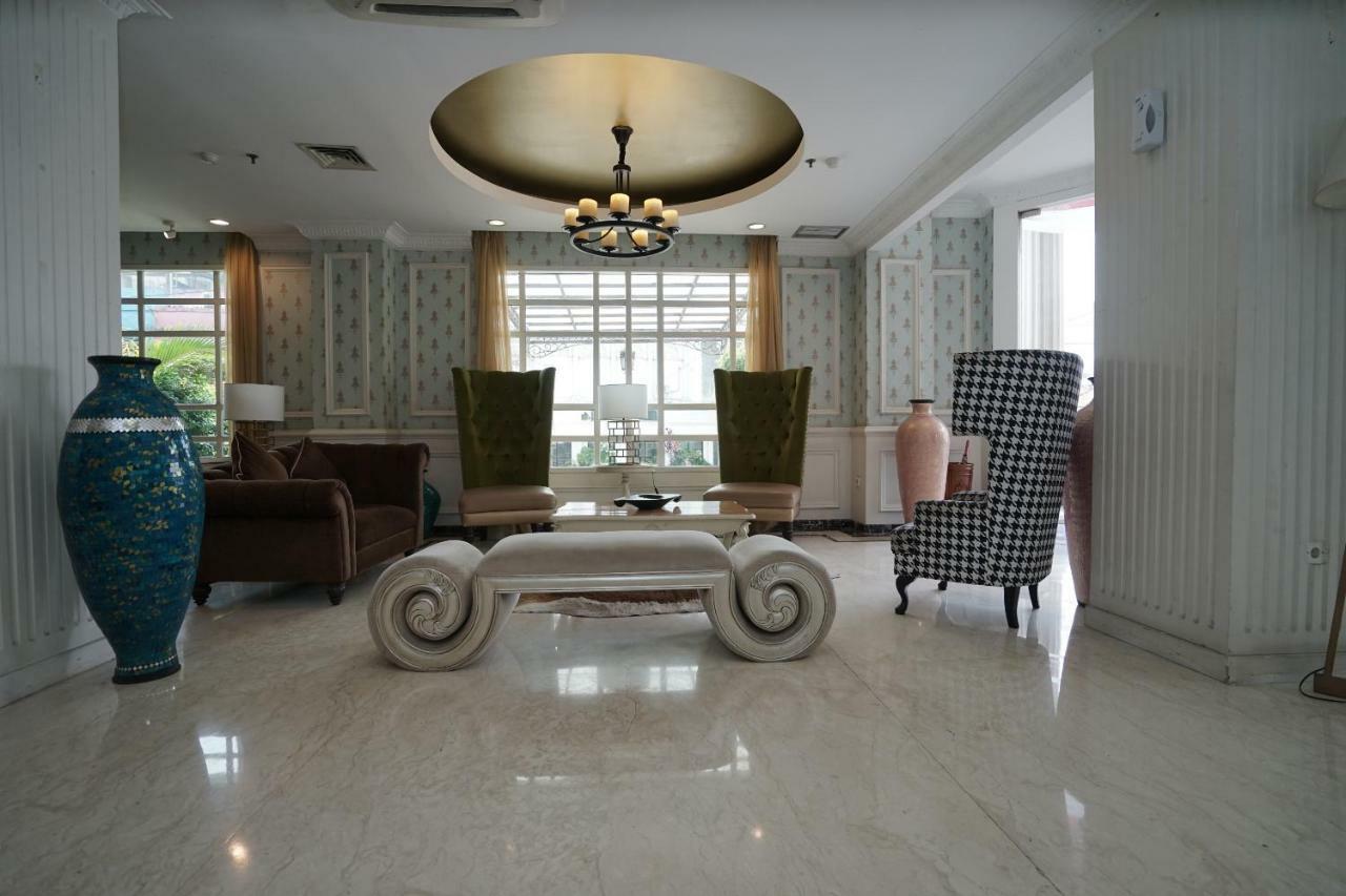 Capital O 1128 Hotel Imara Palembang Exterior photo
