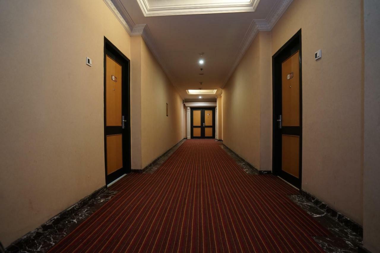 Capital O 1128 Hotel Imara Palembang Exterior photo