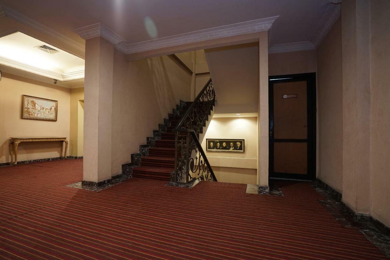 Capital O 1128 Hotel Imara Palembang Exterior photo