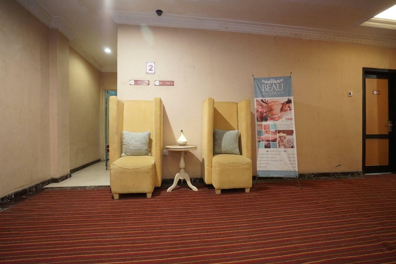 Capital O 1128 Hotel Imara Palembang Exterior photo
