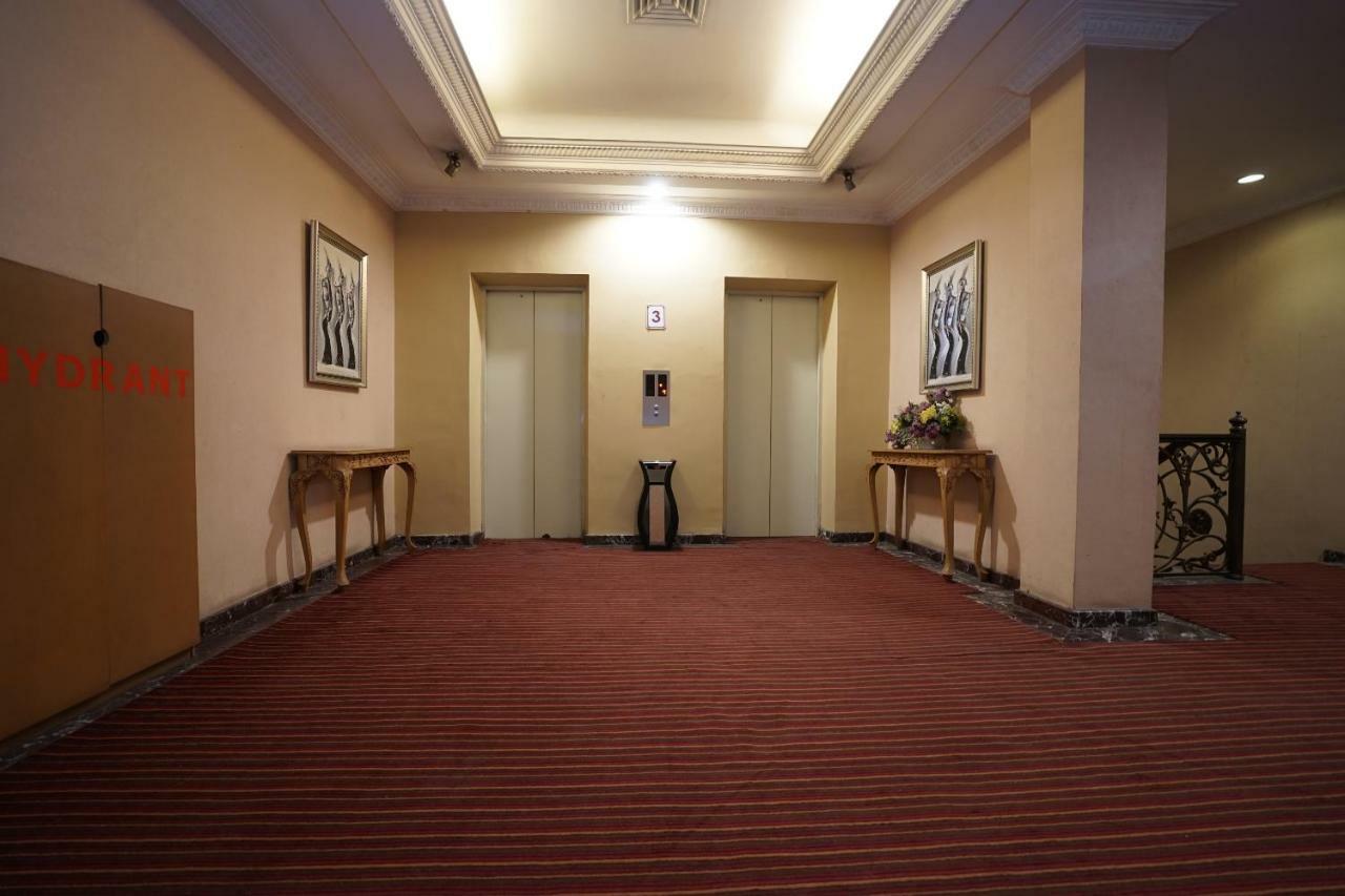 Capital O 1128 Hotel Imara Palembang Exterior photo