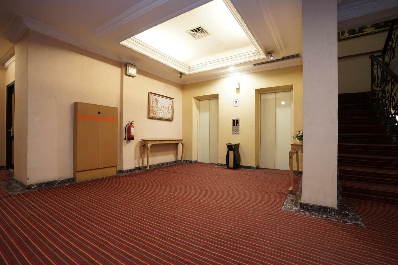 Capital O 1128 Hotel Imara Palembang Exterior photo