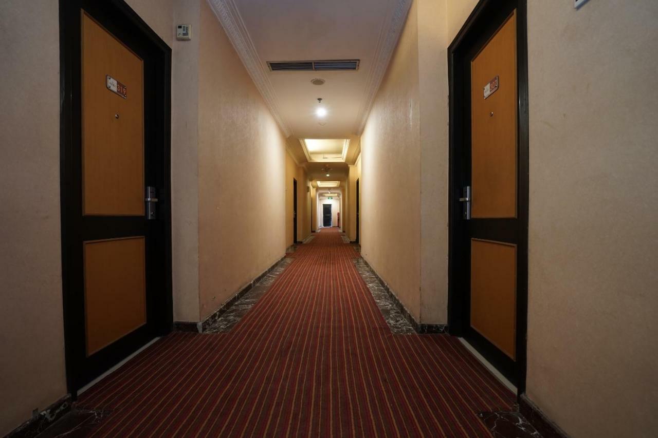 Capital O 1128 Hotel Imara Palembang Exterior photo